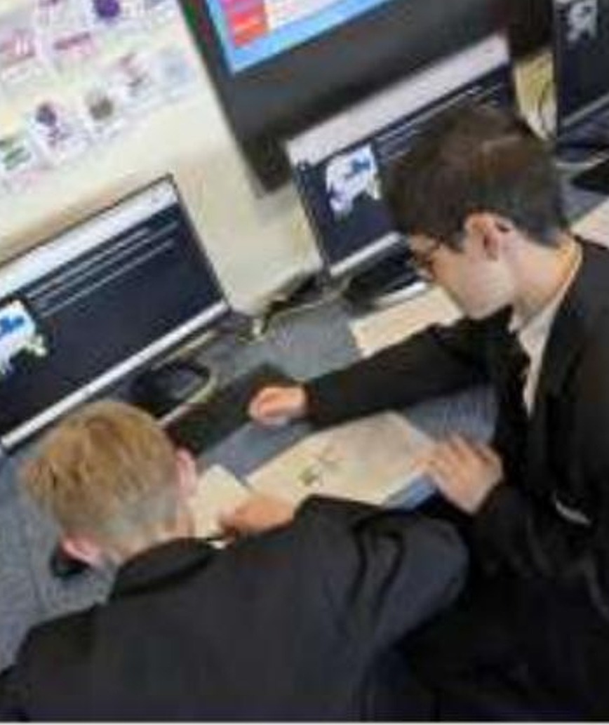 Close-up of a pupil completing the Intelligent Piece of Paper activity on a laptop